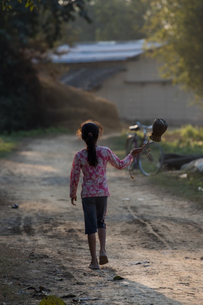 girl-swinging-fish-basket