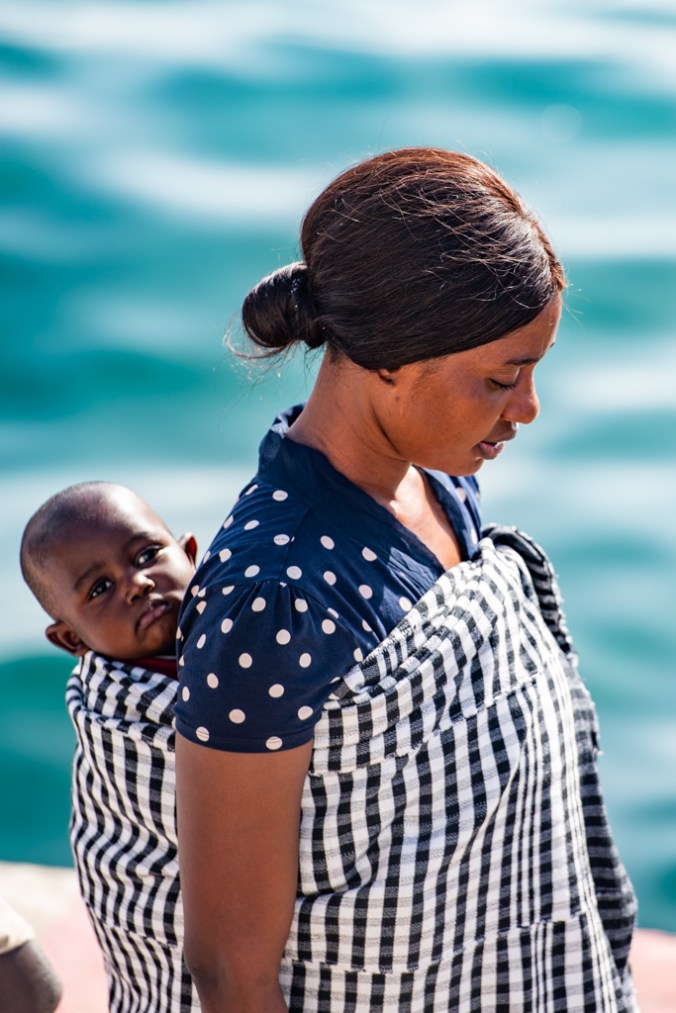 Woman and baby off ferry